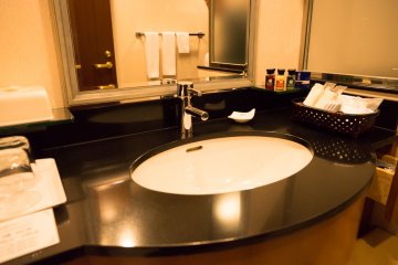 <p>Amenities include shampoo, conditioner, body soap, face and hand soap, cleansing oil, gel lotion, milky gel, a toothbrush, toothpaste, a razor, bar soap, bath salts, a scrubbing towel, shower cap, sanitary bag, hair tie, hair brush and cotton swabs (Q-tips).</p>