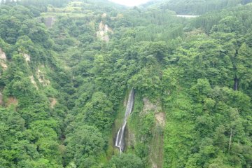 <p>Two waterfalls can be seen from the middle of the bridge</p>