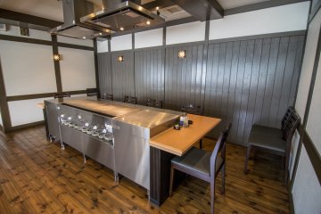 <p>The teppanyaki section is well lit and airy. This table seats up to nine, with the two chefs putting up a display for your viewing pleasure.</p>