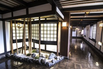 <p>Here, a mini Japanese stone garden adds to the experience of dining at Inanba.</p>