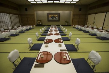 <p>The same Banquet hall in Chotokan, set up for another occasion, with an entirely different seating arrangement.</p>