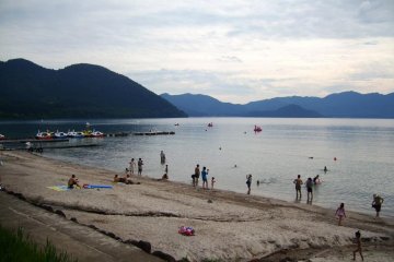 The lake front beach with an excellent mountain view