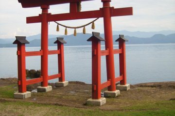 There are plenty of places to check out around the circumference of the lake, like this tori gate at Gozanaishi Shrine