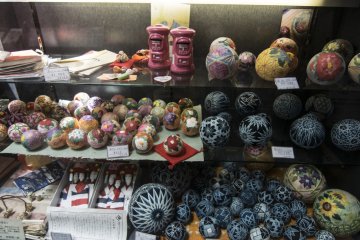 <p>The round balls here on display are called temari, literally 'handball'. I would imagine it used to be a sport, until the decorations became so intricate it is now more of an art form.</p>