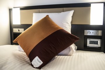 Each bed comes with feather pillows and a memory foam pillow. You can get more upon request from the reception.
