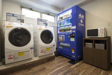 This laundry area is located on the 2nd floor. The laundry machines are coin operated.