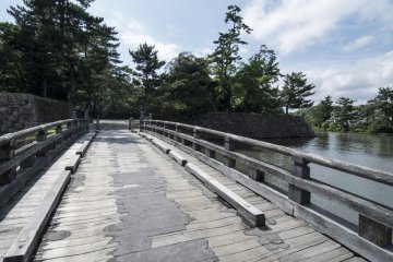 <p>Wooden Bridges, reinforced structurally but otherwise original as they were built, lead across the moat into Matsue Castle.</p>