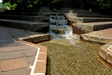 <p>A man-made waterfall and stream invites paddlers</p>