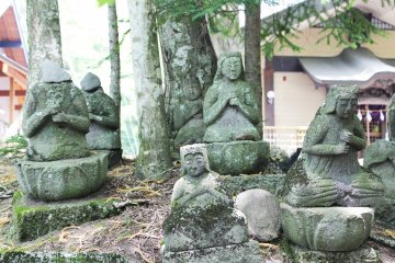 <p>More fascinating statues beside the shrine</p>