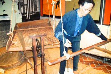 Exhibition showing winnowing