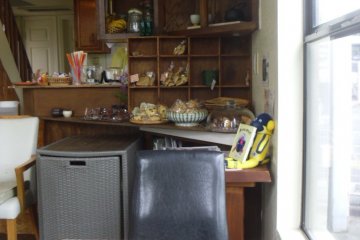 <p>It looks like someone's house, but with nicely wrapped Western-style treats on the counter</p>