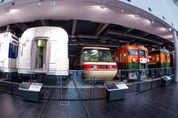 <p>Old and new local trains located at the back of the park</p>