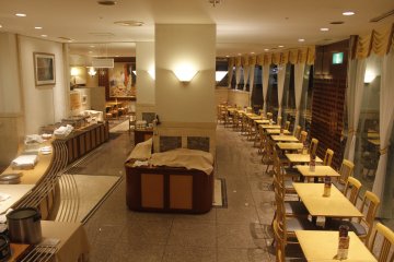 <p>The dining room late at night, after the visitors have eaten.</p>