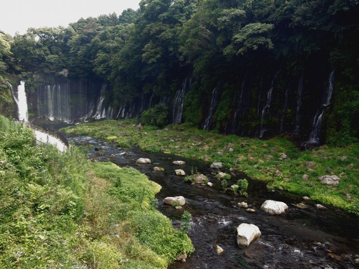 <p>A shallow, rocky river collects the water</p>
