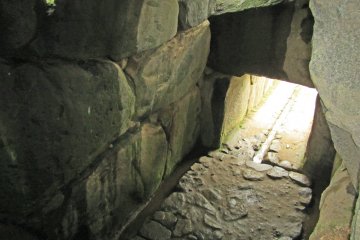 <p>Looking down into the Ishibutai's burial chamber</p>
