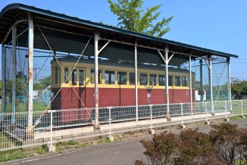 <p>An old tram next to the station</p>