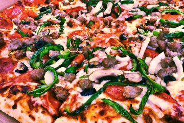 <p>Stop by one of the many eateries in the city that serve food ranging from local delicacies to global staples like pizza.</p>