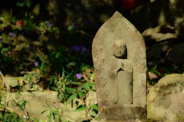 <p>Buddha statue in the garden</p>