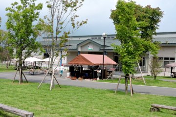 <p>The milk factory has a jersey cow on its gable</p>
