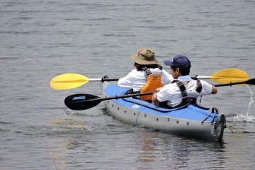 <p>A pair of kayakers head out to open water</p>