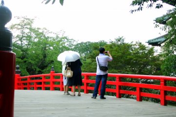 Guests taking pictures of Hirosaki Castle