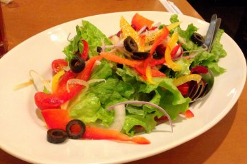<p>Their vegetable salad topped with my favorite olive slices was indeed a delectable appetizer. We did not regret ordering it.</p>