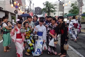 <p>Lovely young ladies wear their yukata and kimonos to the event.</p>