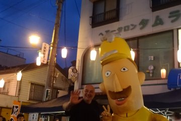 <p>Nathan and the local mascot.</p>