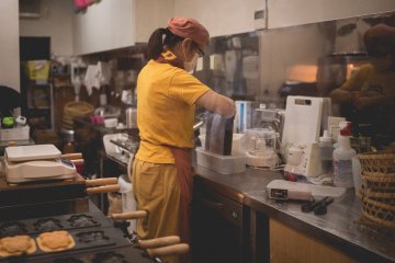 <p>Working in the Taiyaki kitchen</p>