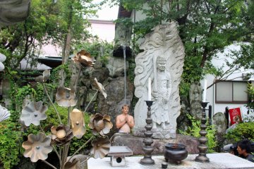<p>The altar, the image of Fudomyo and the ritual continuing in the background</p>