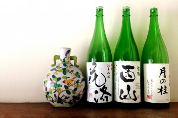 Beautiful sake bottles grace the interior of Cooking Sun.