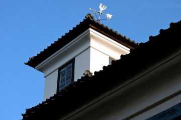 Weather vane on one of the school houses