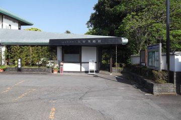 <p>The entrance from the main road, taking you first through the garden</p>