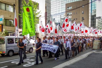 <p>Despite the long line of flag bearing participants, most of these people are more concerned about contemporary social and welfare issues as opposed to postmodern nationalistic ideology</p>