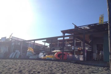 Rental shops provide beach toys and umbrellas