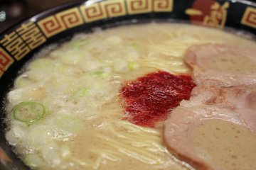 <p>Close-up of the char siu and spicy red sauce</p>