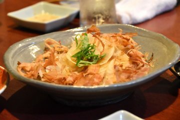<p>Sliced radish and katsuobushi salad (dried bonito shavings)</p>
