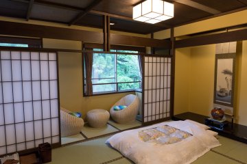 <p>A room at the Roan offers soft, fluffy futons as well as a sitting room with a beautiful view</p>