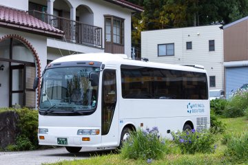 <p>The White Ring Tour Bus</p>