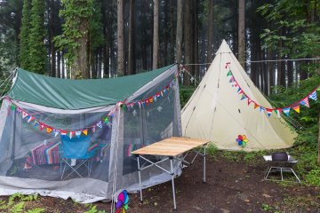 <p>The grounds of the Roan feature a camping area with slack line</p>