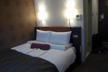 The bed is comfortable and spacious, and the memory foam pillow is great to sleep on.
