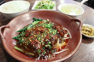 Oysters in a spicy soup at Sekkomon