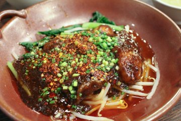 Fried oysters from Miyagi prefecture served in a Sichuan-style spicy soup