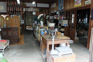<p>A rice store with original furniture, scales and tools from days past</p>