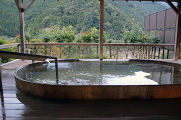 <p>The wood construction outdoor bath. A rock construction outdoor back also exists. Men and women alternate between the baths every 12 hours</p>