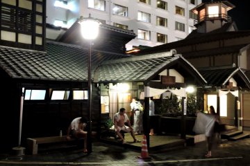<p>One of the town's free public baths stands nearby</p>