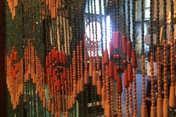 <p>The curtain separating the back dart room.</p>
