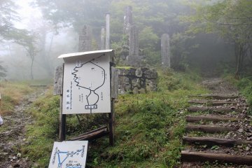 <p>The junction separating the regular hiking trail and the path of worship. The right fork is the easy way, the left fork leads to the Three Tests of Courage</p>