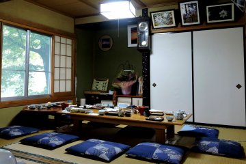 <p>Low tables with cushions on tatami matting. There were a few seats at a western style table, but I like sitting on the floor.</p>
