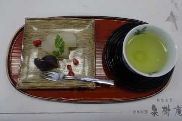 <p>Green tea and a tasty dessert</p>